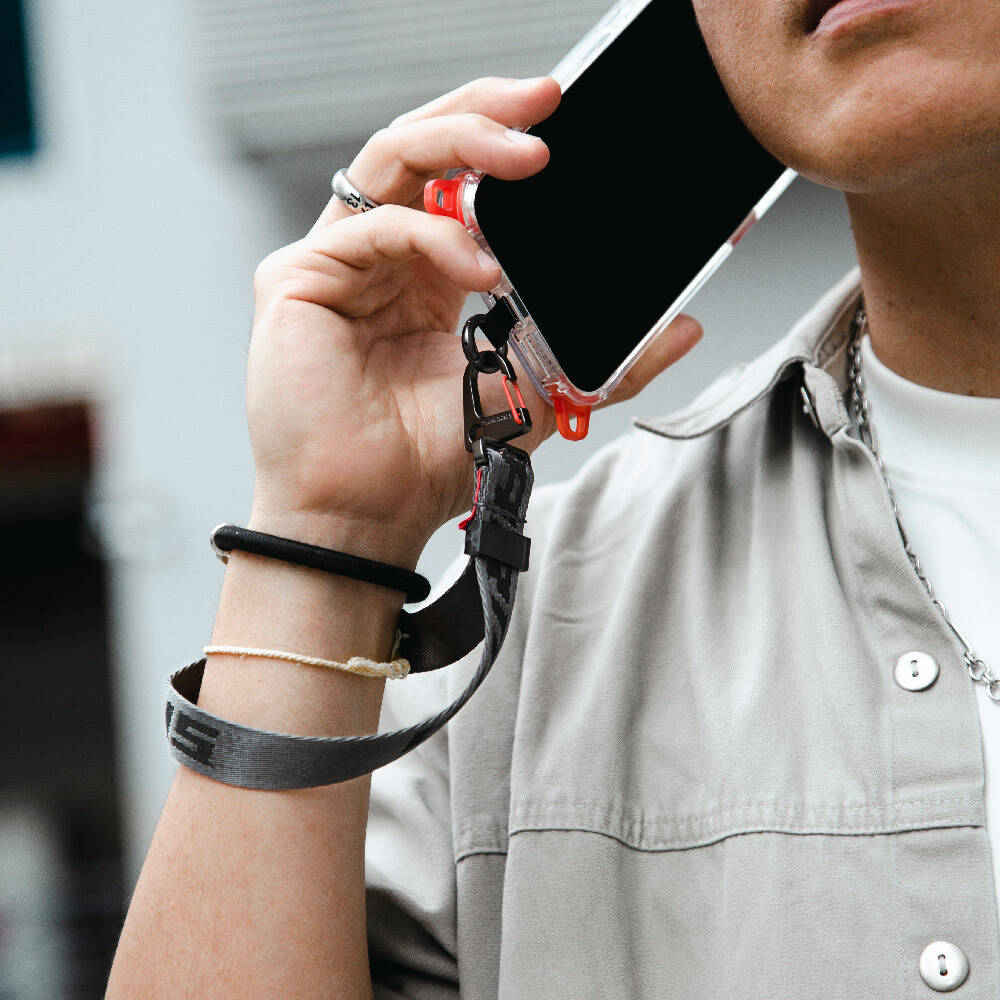 SkinArma Scout Serisi Logolu Telefon Bilek Askı Kayışı SkinArma Scout Serisi Logolu Telefon Bilek Askı Kayışı